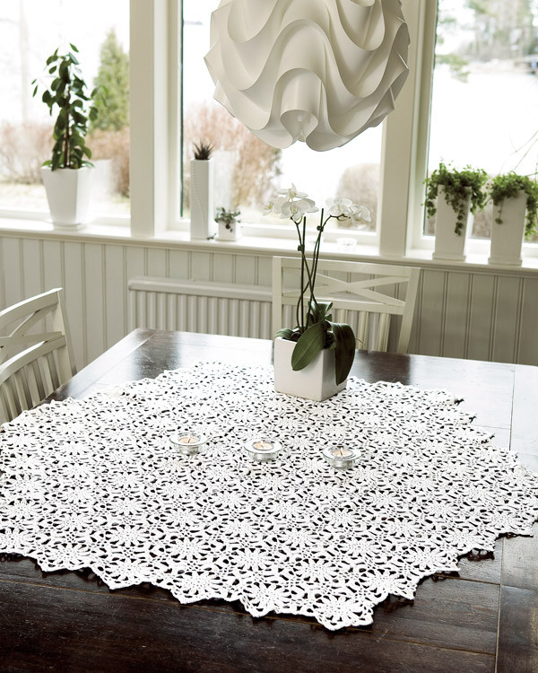 Duk med cirklar av blommor